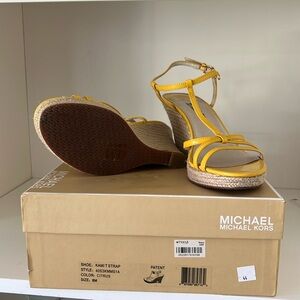 Michael Kors Yellow platform sandals. Size 8. Only worn once, in original box.